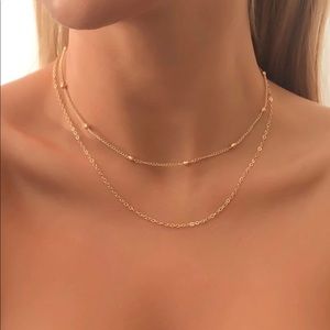 Gold colored simple layered necklace NWT